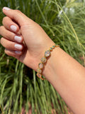Pulsera gotas brillantes. Laminado en oro 14k.