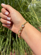 Pulsera gotas brillantes. Laminado en oro 14k.