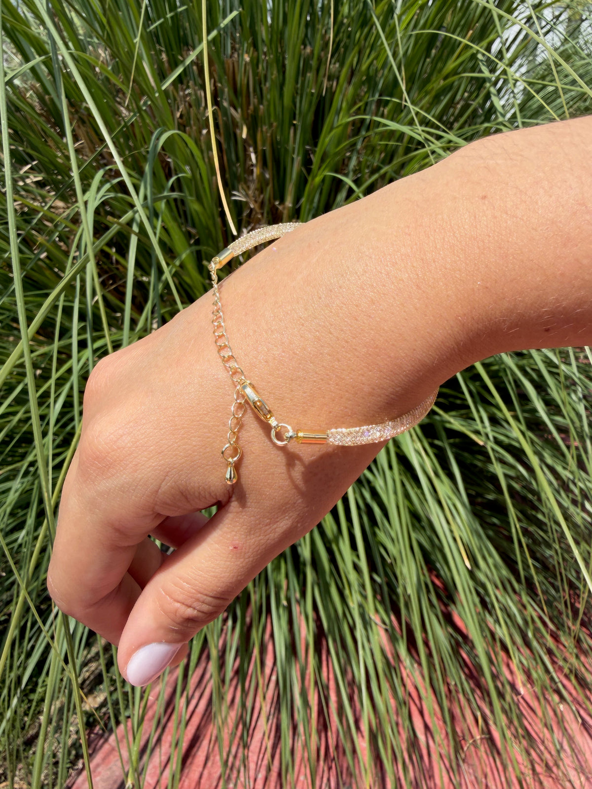Pulsera cristales. Laminado en oro 14k.