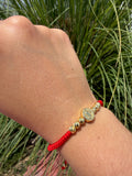 Pulsera San Benito. Laminado en oro 14k.