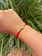Pulsera San Benito. Laminado en oro 14k.
