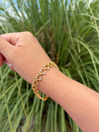Pulsera corazones brillantes. Laminado en oro 14k.