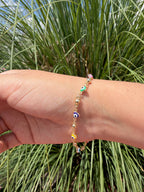 Pulsera ojito colores. Laminado en oro 14k.