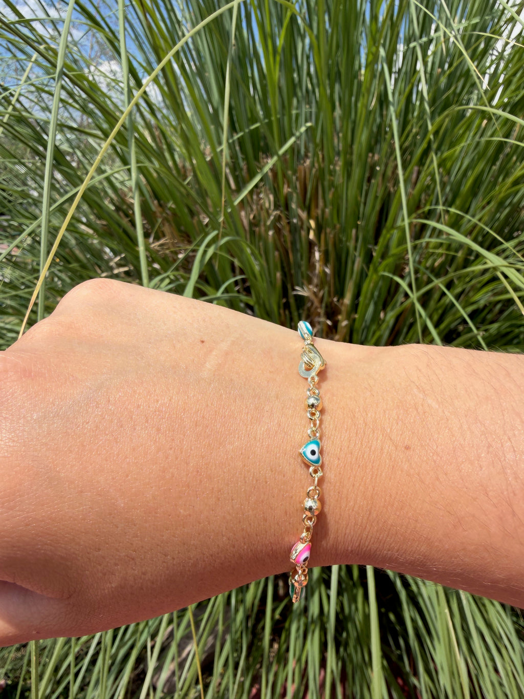 Pulsera ojito colores. Laminado en oro 14k.