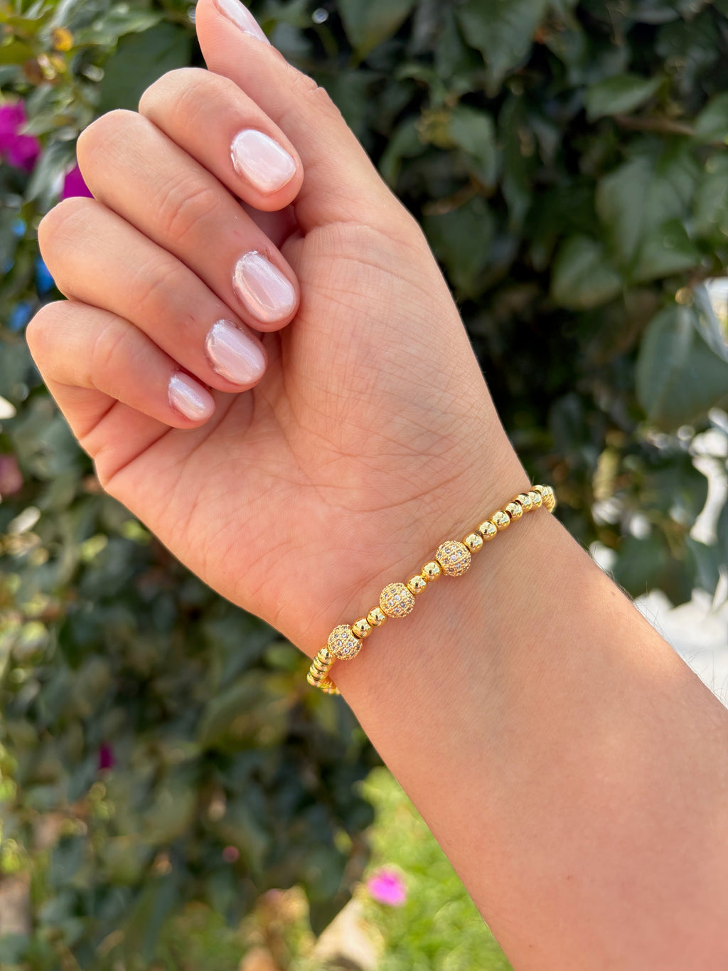 Pulsera esferas brillantes. Laminado en oro 14k.