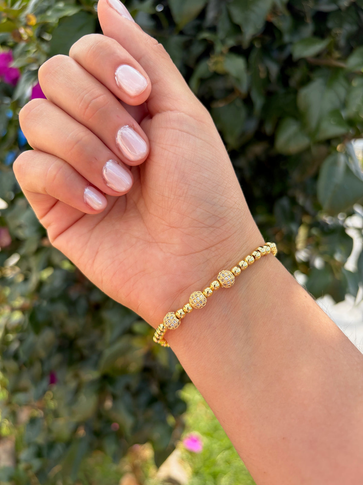 Pulsera esferas brillantes. Laminado en oro 14k.