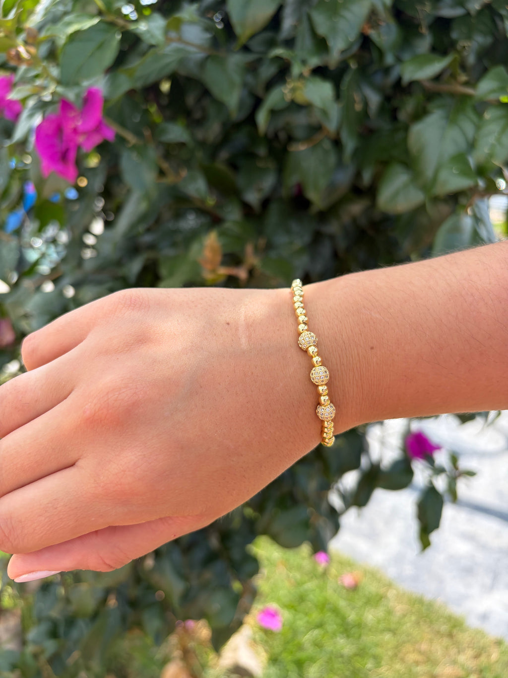Pulsera esferas brillantes. Laminado en oro 14k.