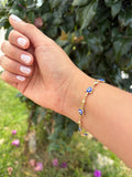 Pulsera ojito tortuga. Laminado en oro 14k.