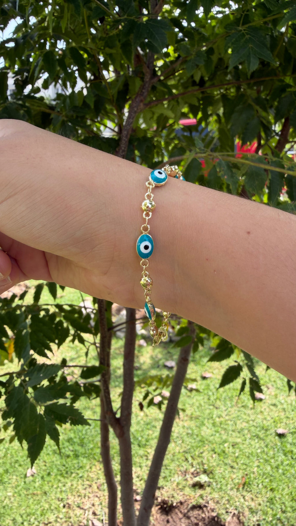 Pulsera ojito turco color aqua. Laminado en oro 14k