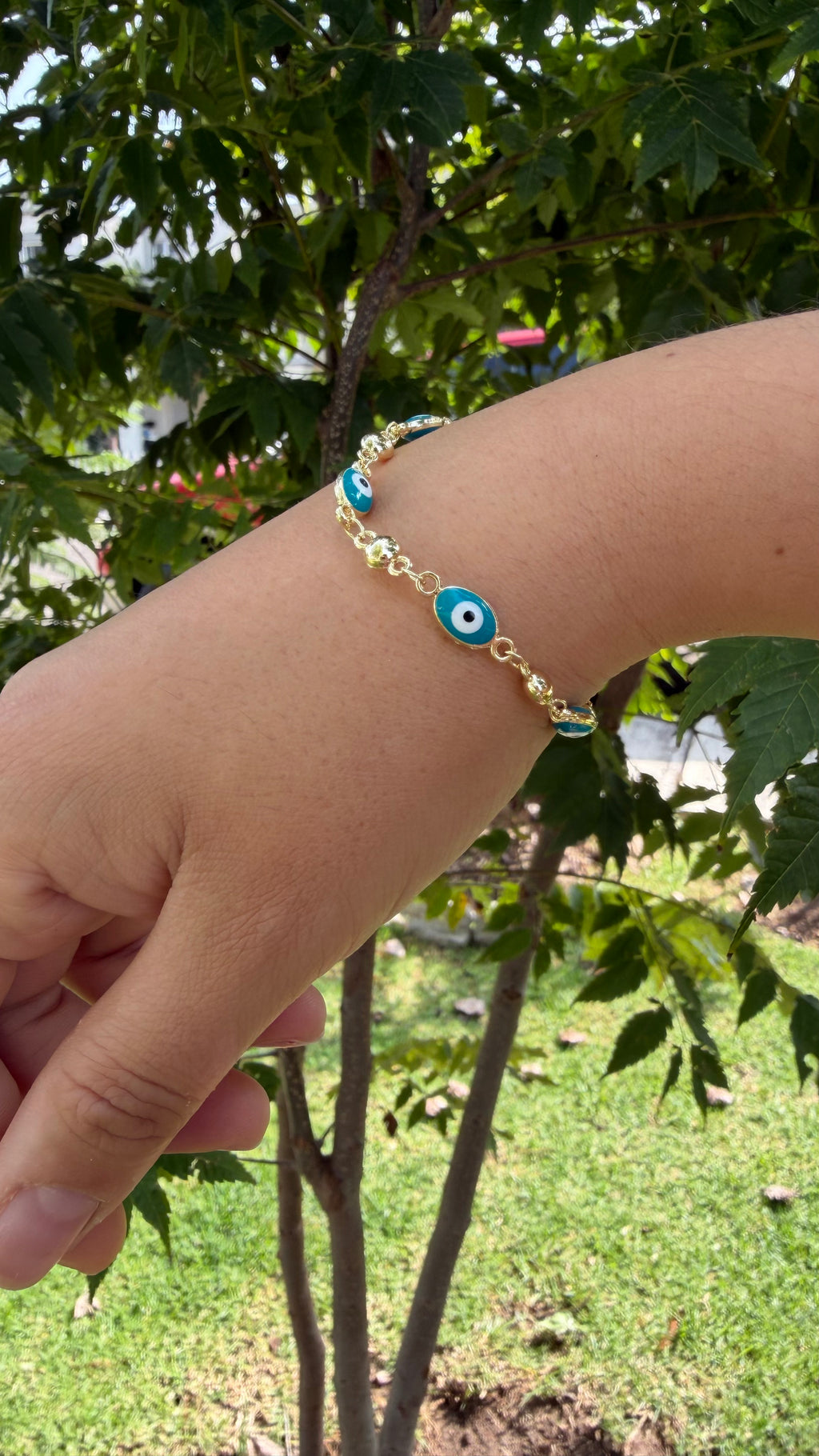 Pulsera ojito turco color aqua. Laminado en oro 14k