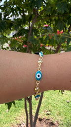 Pulsera ojito turco color aqua. Laminado en oro 14k