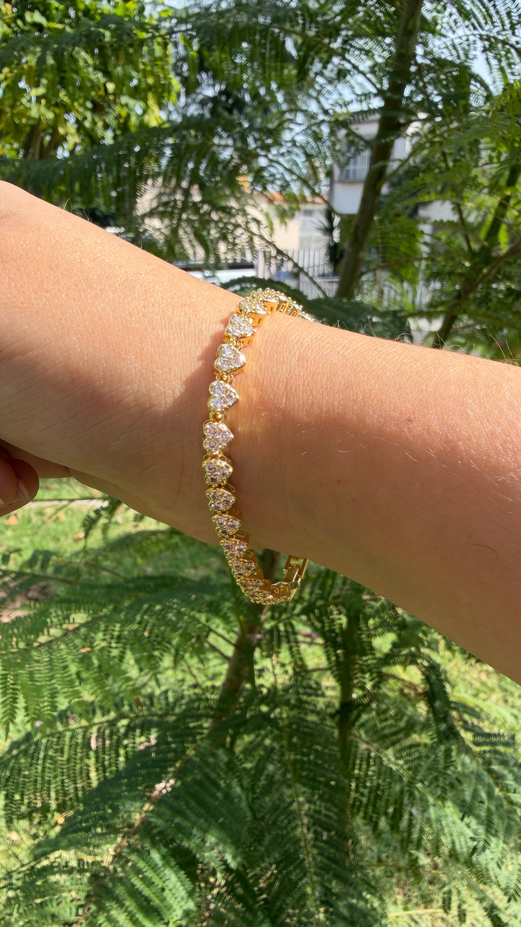 Pulsera corazones zirconia. Laminado en oro 14k