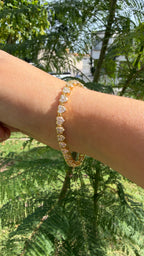 Pulsera corazones zirconia. Laminado en oro 14k