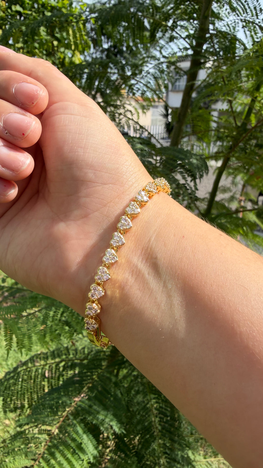 Pulsera corazones zirconia. Laminado en oro 14k