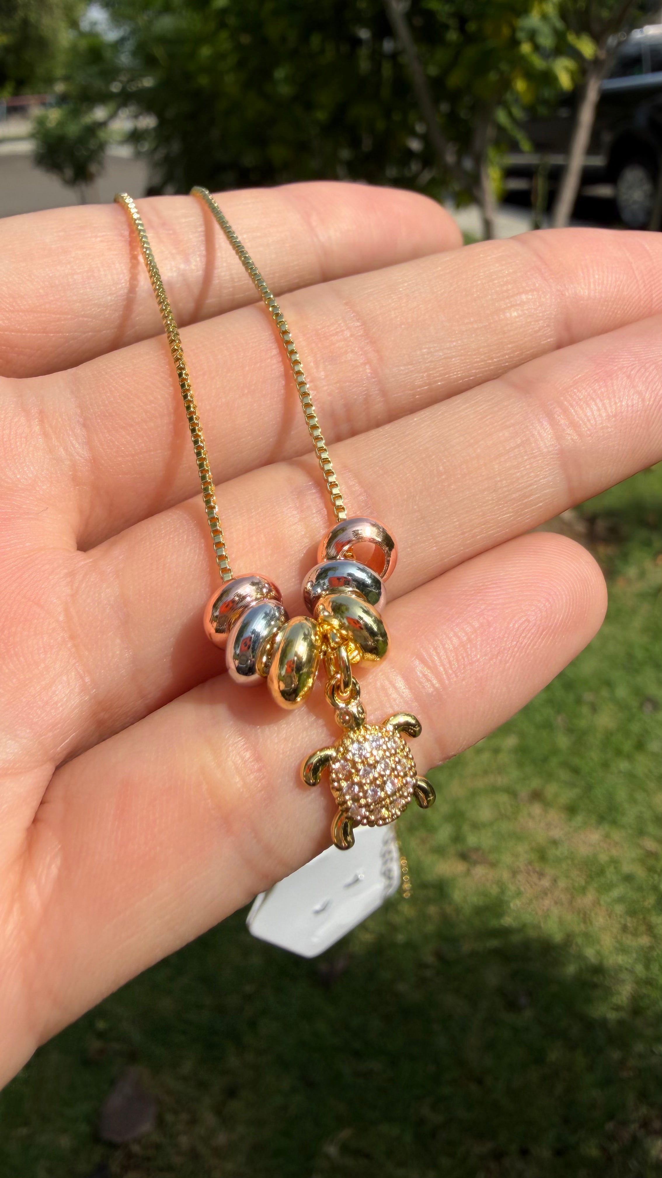Collar tortuguita. Laminado en oro 14k