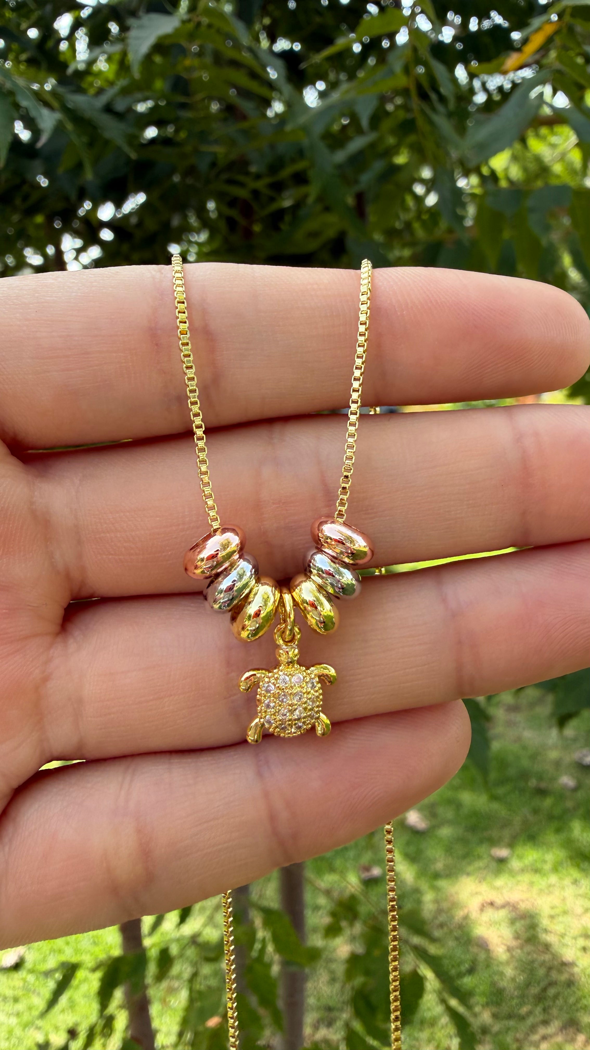 Collar tortuguita. Laminado en oro 14k