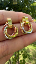 Aretes círculos entrelazados 3 colores. Laminado en oro 14k