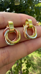 Aretes círculos entrelazados 3 colores. Laminado en oro 14k