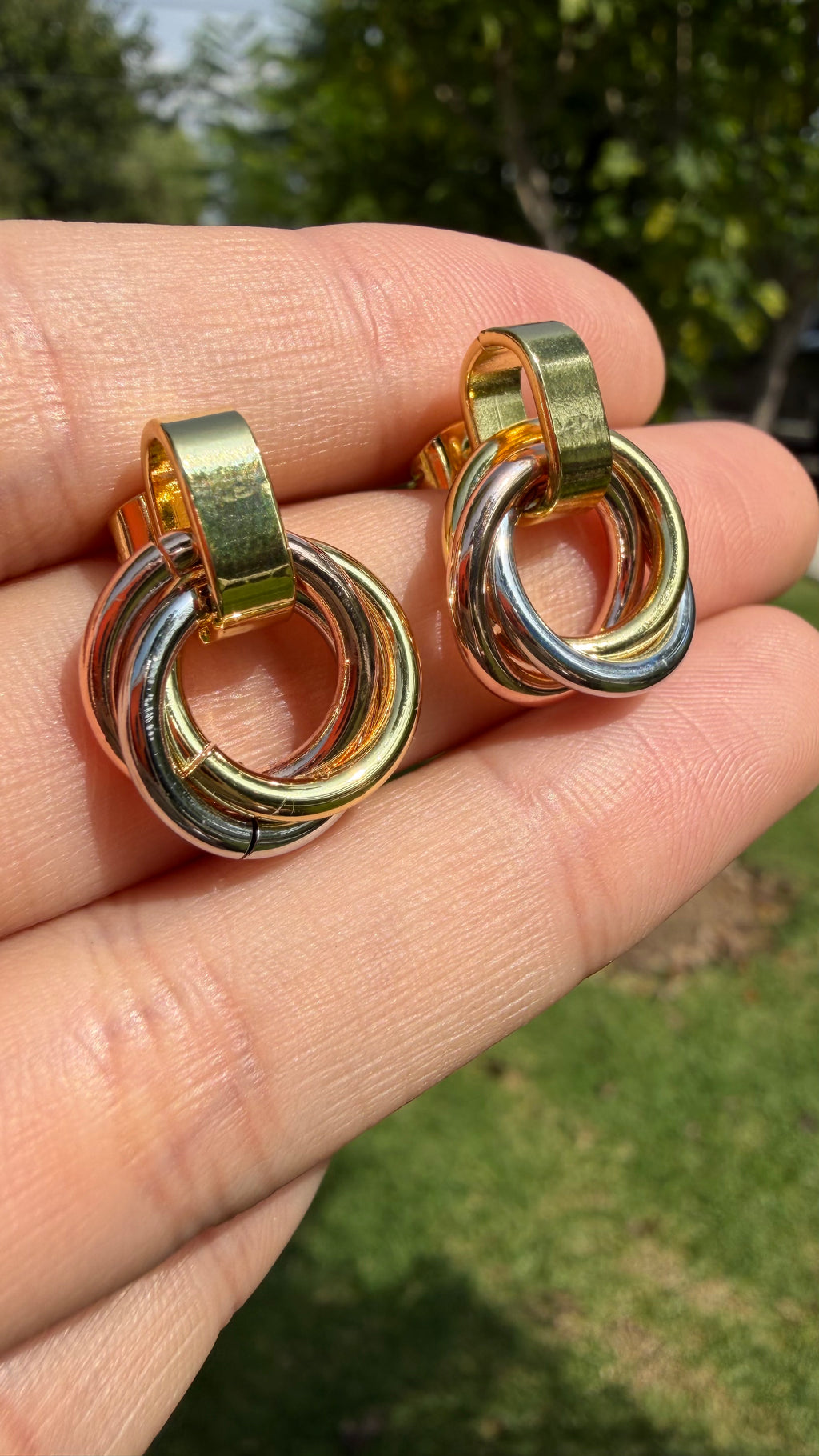 Aretes círculos entrelazados 3 colores. Laminado en oro 14k