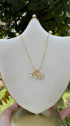 Collar flor + arcoiris. Laminado en oro 14k