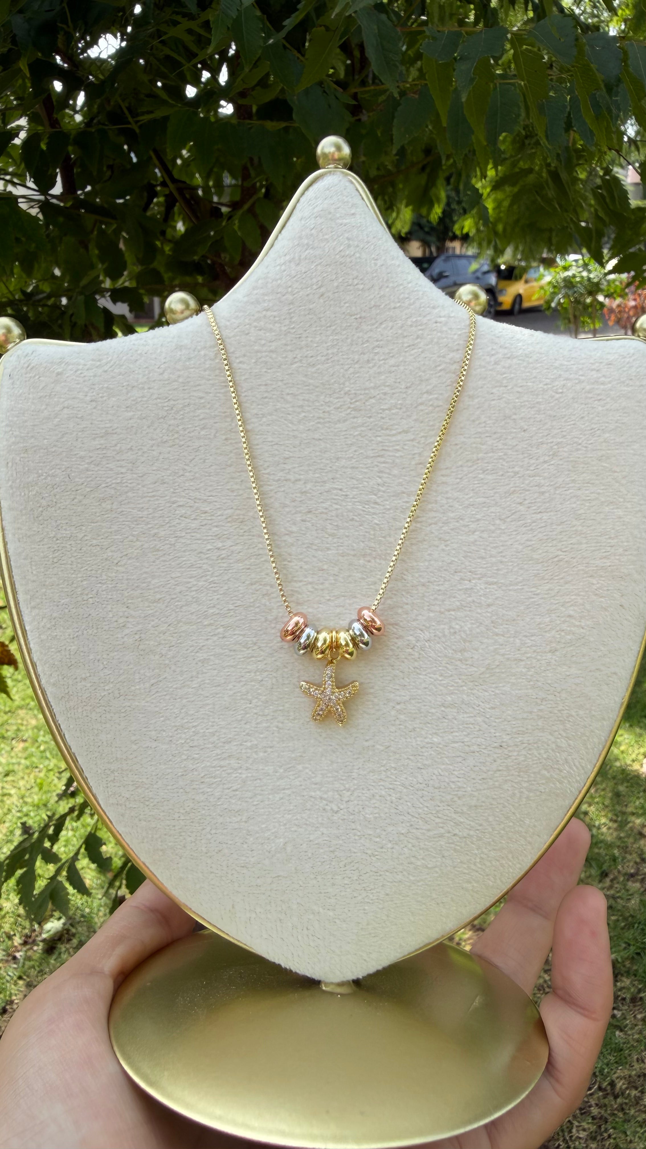 Collar estrellita de mar con zirconias. Laminado en oro 14k