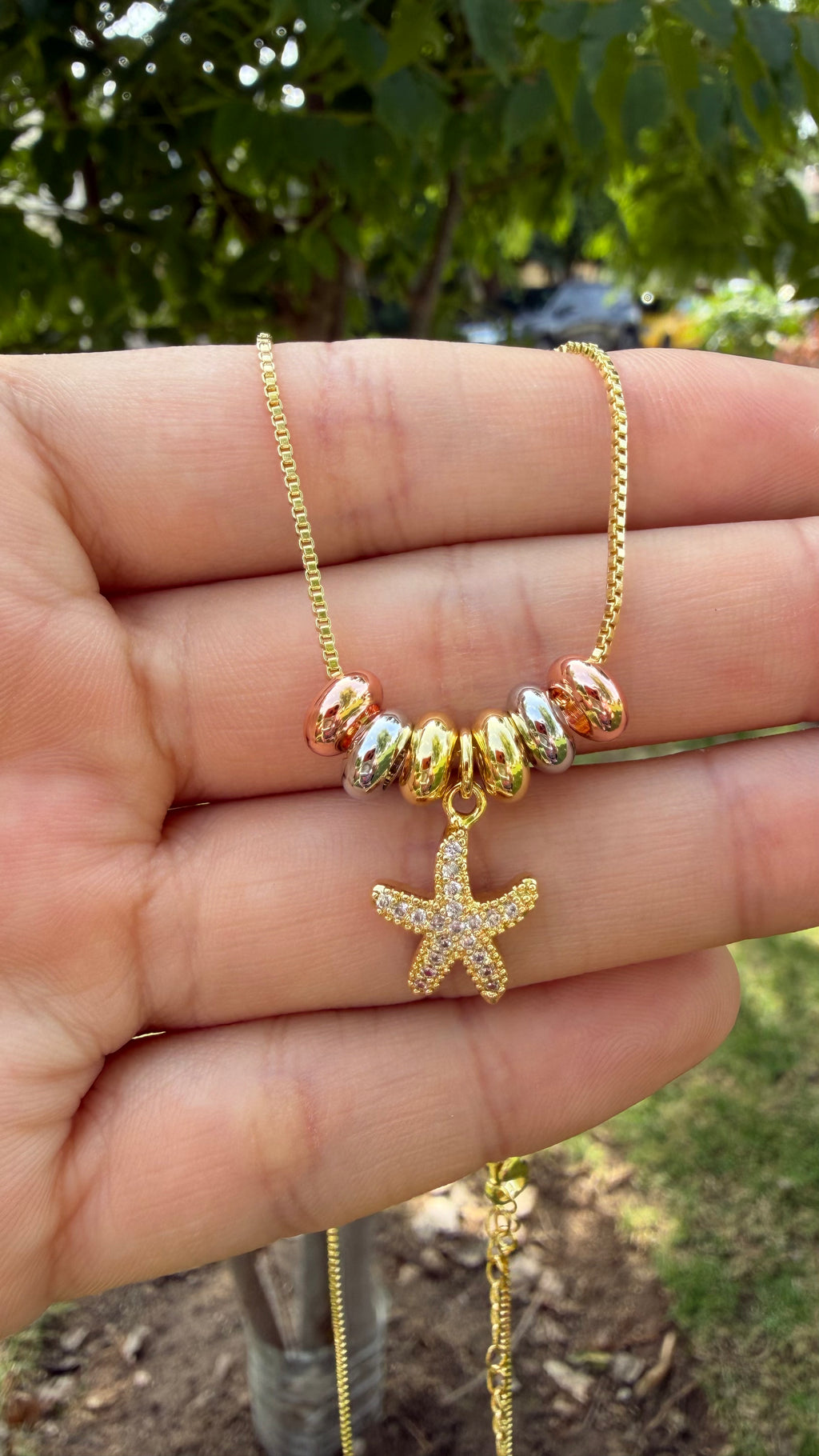 Collar estrellita de mar con zirconias. Laminado en oro 14k