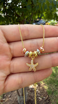 Collar estrellita de mar con zirconias. Laminado en oro 14k