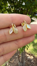 Aretes colita de sirena. Laminado en oro 14k