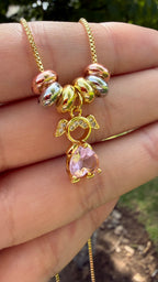Collar niñita rosa. Laminado en oro 14k